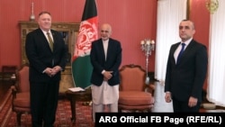 Afghan President Ashraf Ghani (C) with the U.S. Secretary of State Mike Pompeo (L) and Vice President Amrullah Saleh in the Arg presidential palace on March 23.