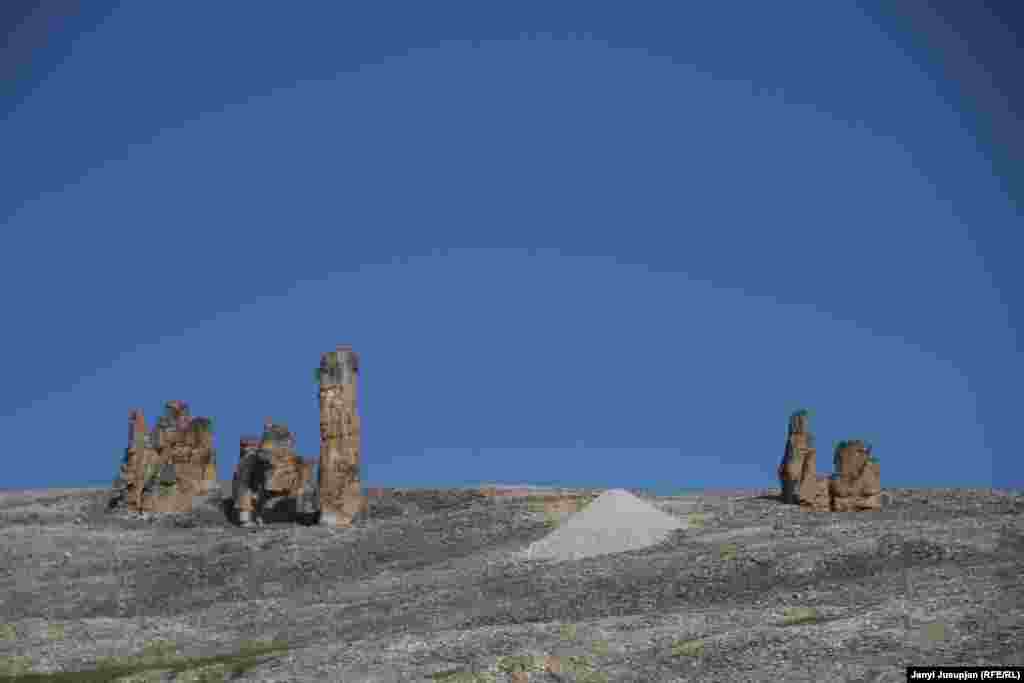 Stone outcroppings and mine tailings at the site of a former uranium mine. The region was also a source of tin ore.