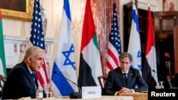 Israeli Foreign Minister Yair Lapid (left) and U.S. Secretary of State Antony Blinken hold a briefing at the U.S. State Department on October 13.