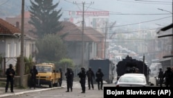 Police officers deploy in the northern, Serb-dominated part of the ethnically divided town of Mitrovica on October 13.