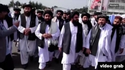 Members of the Taliban leadership walk in Kabul after the militants took control of the capital in August 2021.
