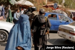 The Taliban patrolling the streets of Kabul in October.