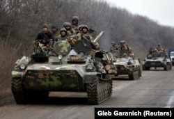 Українські військові після відходу з Дебальцева