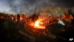 Migrants in Belarus at a camp near the Polish border. (file photo)