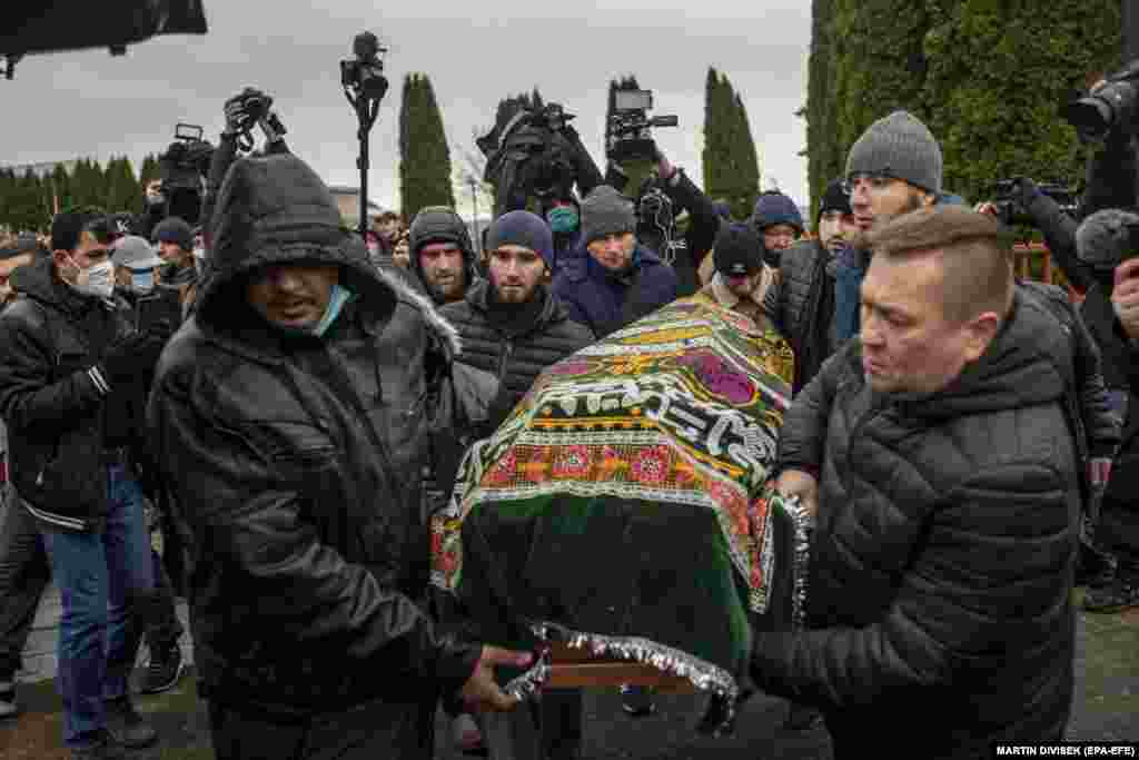 Mourners carry the coffin of Yemeni migrant Mustafa Mohammed Murshed al-Raimi in the village of Bohoniki, near the Polish-Belarusian border, in eastern Poland on November 21. The 37-year-old migrant was the third one buried at a Muslim cemetery near the village, after 19-year-old Syrian migrant Ahmed al-Hassan and an unknown migrant from Africa.