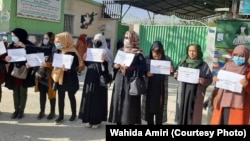 Afghan girls and women at a previous protest in Kabul against the Taliban's restrictions on their access to education, jobs, and society. 