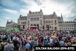 Demonstrators gather in front of the parliament in Budapest on June 5 to protest plans to establish a satellite campus for Shanghai’s Fudan University.