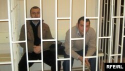 Azerbaijani authorities made abundantly clear what awaited those who aired dissenting political opinions online by jailing Emin Milli (left) and Adnan Hajizada.