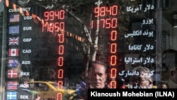 Tehran Forex market (Currency Exchange Market) on December 12, 2018 showing the U.S. dollar trading just below 100,000 rials..