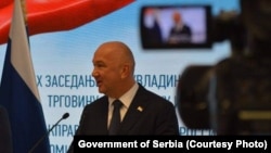 Ministar bez portfelja u Vladi Srbije Nenad Popović je zadužen za oblast međunarodne ekonomske saradnje i društveni položaj crkve u zemlji i inostranstvu. Od novembra 2023. je pod sankcijama SAD zbog bliskih veza sa Kremljom.
