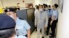 Джими Лай при първия си арест през август