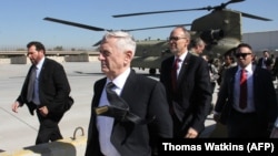 The new U.S. Secretary of Defense James Mattis (front and center), arrives in the Iraqi capital, Baghdad, on February 20.