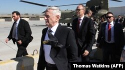 U.S. Secretary of Defense James Mattis (center) arrives in the Iraqi capital, Baghdad.