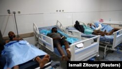 Migranți africani răniți la Tajoura, în Spitalul Central din Tripoli, 3 iulie 2019.
