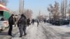 Kyrgyz authorities at the scene after the violence broke out between local residents in Uzgen and workers from China on January 9.
