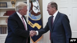 U.S. President Donald Trump (left) shakes hands with Russian Foreign Minister Sergei Lavrov at the White House on May 10.