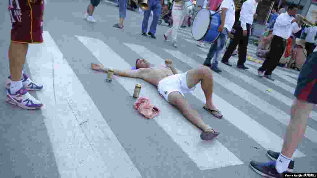 A young man takes a break from partying.