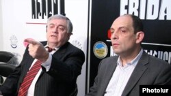 Armenia -- Lawyer Ruben Sahakian, left, and human rights activist Avetik Ishkhanian hold a news conference in Yerevan on May 5, 2009.