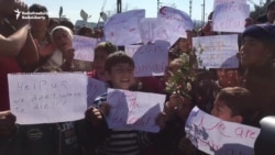 Protesting Refugees Block Train At Greece-Macedonia Border