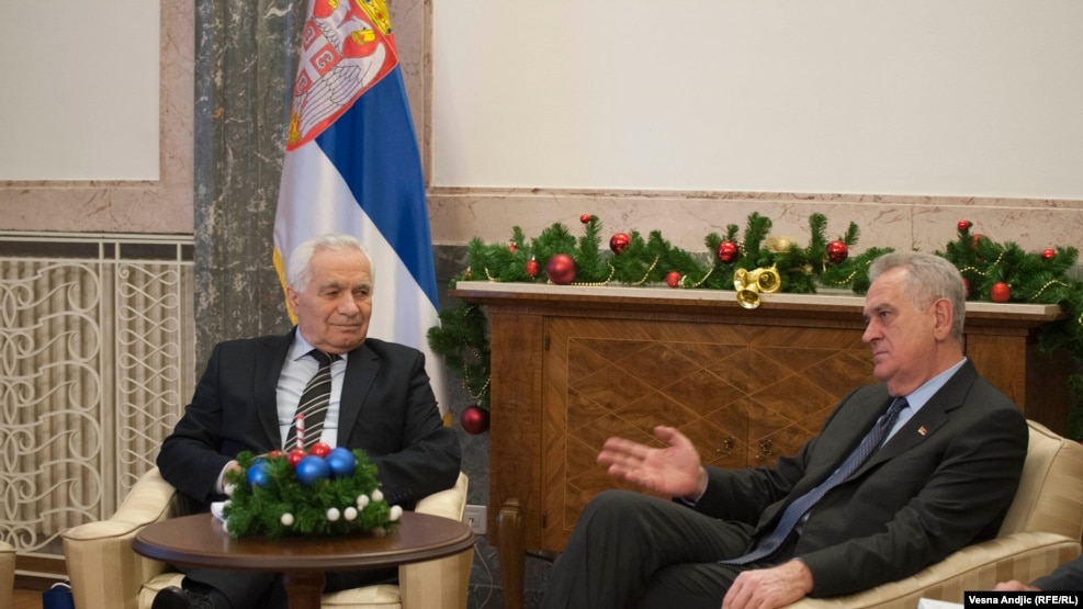 The decision by Serbian President Tomislav Nikolic (right) to meet with convicted war criminal Momcilo Krajisnik on January 11 has raised hackles in Bosnia-Herzegovina.