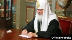 Патріарх Кирило на зустрічі з міністром юстиції Росії. Фрагмент вихідної фотографії