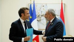 French President Emmanuel Macron meets with Armenian Prime Minister Nikol Pashinian on the sidelines of the Francophonie summit in Djerba, Tunisia. November 19, 2022.