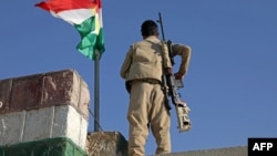 İraqda kürd döyüşçüsü