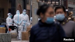 В Китае – новая вспышка коронавируса: 32 тысячи заболевших за сутки