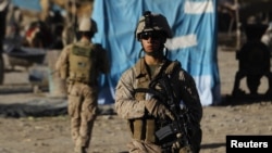 U.S. Marines patrol the market in the town of Musa Qala in the southern Helmand Province.