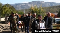 NAGORNO-KARABAKH -- Pople mourn during the funeral of a soldier who died in recent military clashes Karabakh, Stepanakert, October 23, 2020