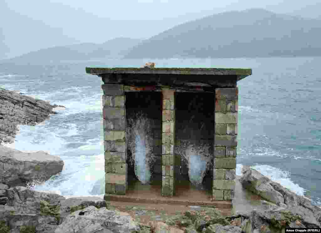 A toilet alongside one of the secret naval bases.&nbsp; Two locals who lived near the bases in the Bay of Kotor had never heard of the camouflaged moorings.&nbsp;