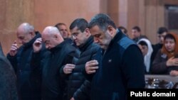 Nagorno-Karabakh - Karabakh's State Minister Ruben Vardanyan (right) and President Arayik Harutiunian (second from right) pray during a Christmas mass at Stepanakert’s Holy Mother of God Cathedral, January 6, 2023.