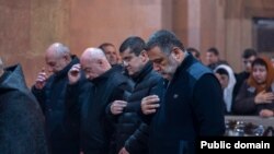 Nagorno Karabakh - Karabakh's State Minister Ruben Vardanyan (right) and President Arayik Harutiunian (second from right) pray during a Christmas mass at Stepanakert’s Holy Mother of God Cathedral, January 6, 2023.