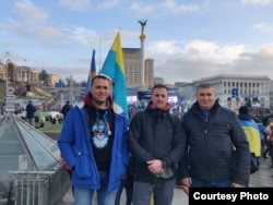 Denys Kosenko (center) with some friends during the Maidan protests in Kyiv.
