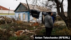 Rus zarbalarynyň Hersonda döreden weýrançylyklary. Dekabr, 2022 ý.