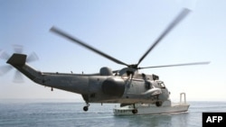 A British Royal Navy helicopter in action (file photo)