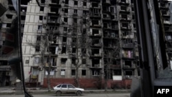 Ulice ukrajinskih gradova za Božić: Prije i poslije ruske invazije