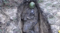 Jezivi posao ekshumacije mrtvih u Ukrajini