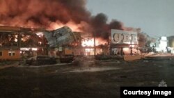 Authorities said that the flames at the Mega shopping center in Khimki spread over an area of about 18,000 square meters.