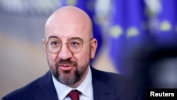 Belgium - European Council President Charles Michel speaks to the media as he arrives for a European Union leaders' summit in Brussels, December 15, 2022.