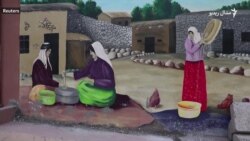 عراقی هنرمند پر دېوالونو په انځورګرۍ سره ارزښتونه پالل غواړي 