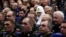 Patrijarh Kiril, poglavar Ruske pravoslavne crkve, sjedi među vojnim oficirima na godišnjem sastanku Kolegija ruskog Ministarstva odbrane u Moskvi u decembru 2022. godine.
