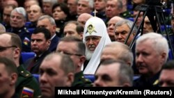 Патриарх Кирилл на заседании коллегии Министерства обороны РФ, декабря 2022 года. 