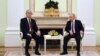 Kazakh President Qasym-Zhomart Toqaev (left) and Russian President Vladimir Putin hold talks in Moscow on November 28.