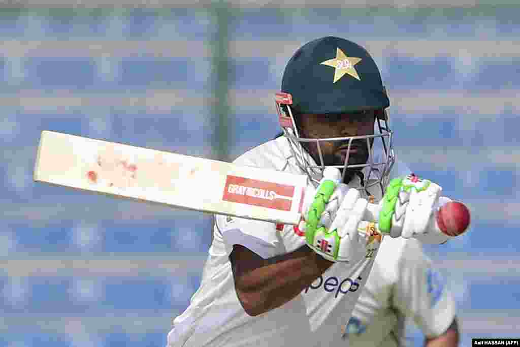 Pakistan&#39;s captain, Babar Azam, plays a shot during the first day of the first cricket test match between Pakistan and New Zealand at the National Stadium in Karachi on December 26.