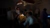Doctors operate on 13-year-old Artur Voblikov inside a hospital in Kherson, southern Ukraine, on November 22.