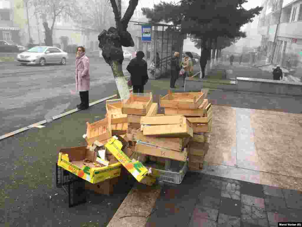 Empty produce boxes near a bus stop in central Stepanakert.&nbsp; For many residents, the ongoing blockade is hard to joke about. Stepanakert mother Anna Muradian is one of around 1,100 people now locked out of her home city after visiting her soldier husband&rsquo;s grave in Yerevan. He was killed in the 2020 conflict with Azerbaijan. &ldquo;On the one hand, [my children] pine for their father. It&rsquo;s suffocating for them&rdquo; Muradian told RFE/RL&rsquo;s Armenian Service. On the other hand,&nbsp;she says that, due to the blockade, her youngest son now &ldquo;misses his mother,&rdquo; too.