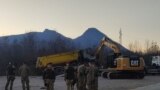 Mechanization under the control of KFOR, EULEX and Kosovo Police removes the barricade in Dudin Krš, north Kosovo, 3th of January 2023