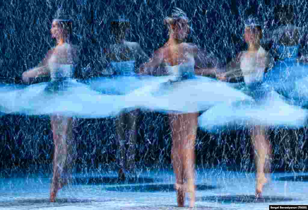 Dancers perform a scene from The Nutcracker ballet staged by choreographer Yuri Posokhov at the Stanislavski and Nemirovich-Danchenko Moscow Academic Music Theater.
