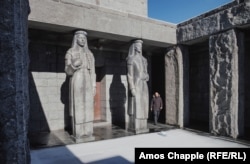 A security guard at the entrance to the mausoleum after it was closed following a snowstorm.